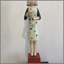 [thumbnail of Etruscan Dress - polychromed wood, ceramic , thread.jpg]